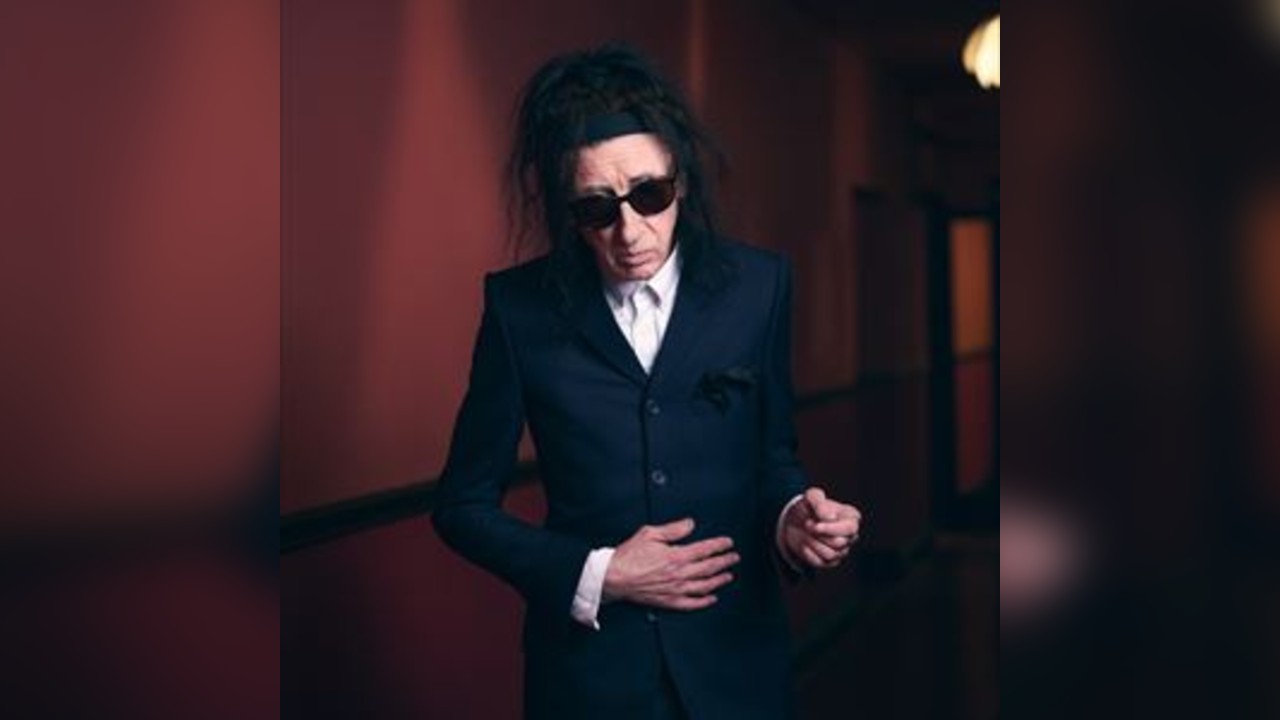 Dr John Cooper Clarke