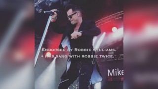 Mike Andrew as Robbie Williams
