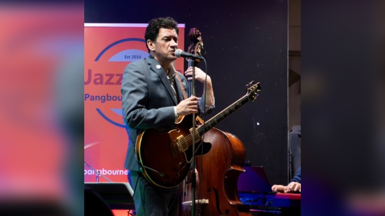 Denny Ilett, guitar and vocals, with The Terry Hutchins Qrt