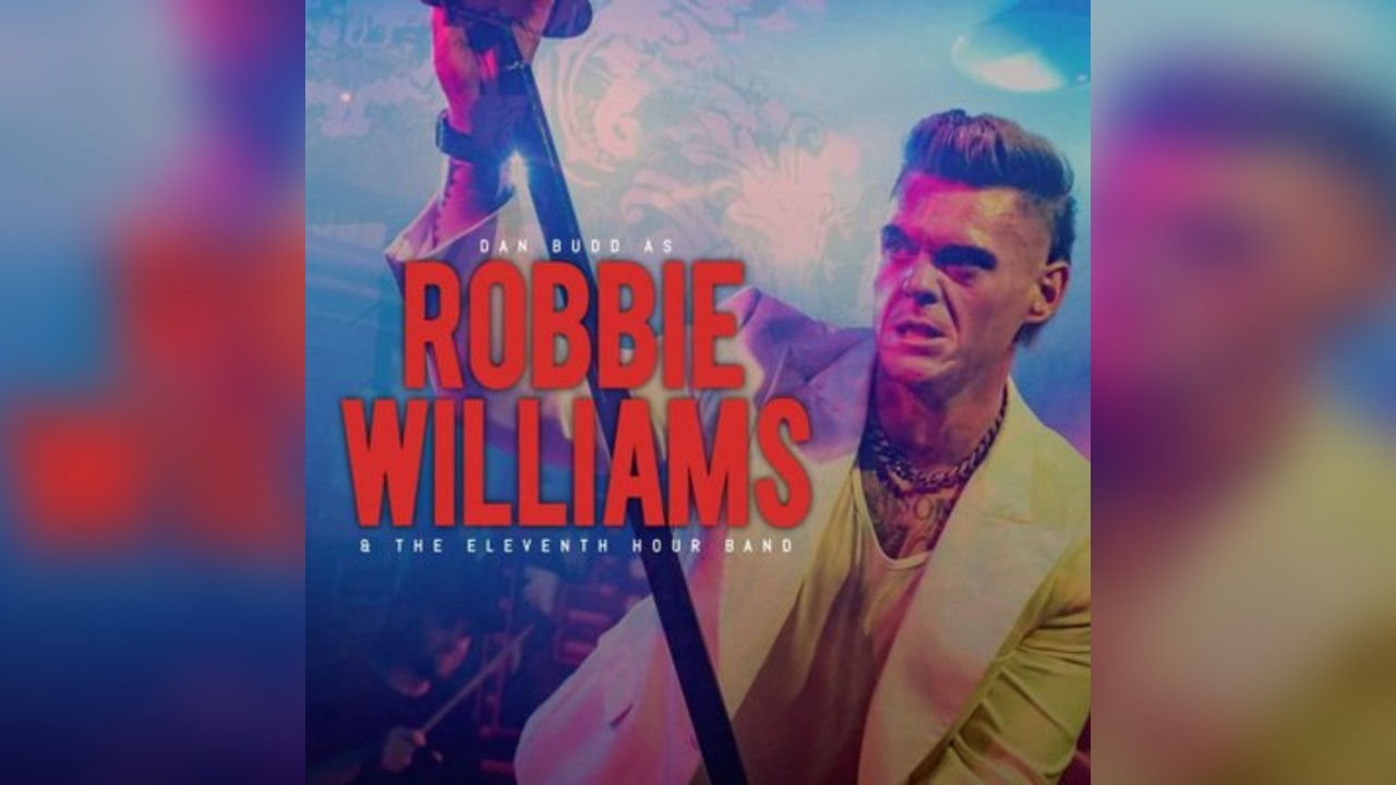 Dan Bud as Robbie Williams