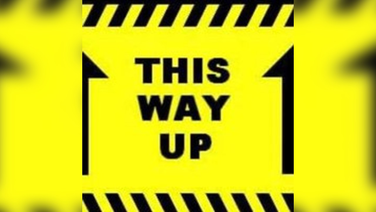 THiS WAY UP